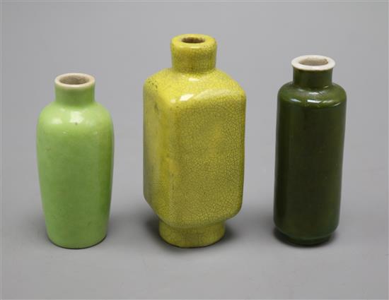 Two Chinese monochrome glazed porcelain snuff bottles and a yellow crackle-glaze miniature vase, 19th century